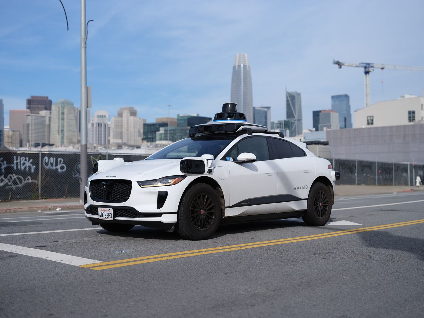 A driverless Waymo Jaguar I-PACE on a street in San Francisco